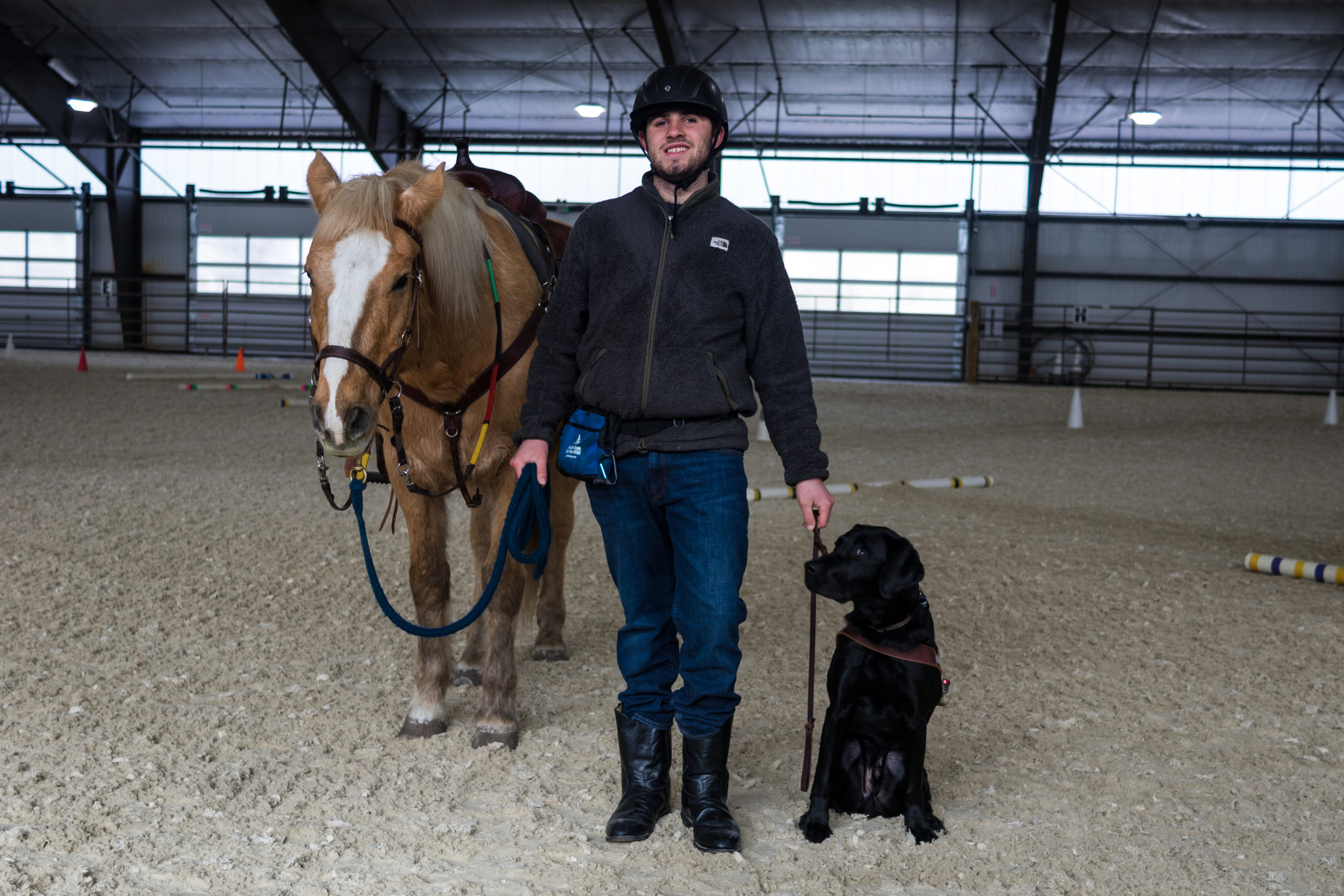Walter with his guide dog Frommer, and Swiftsure horse Pal. 
